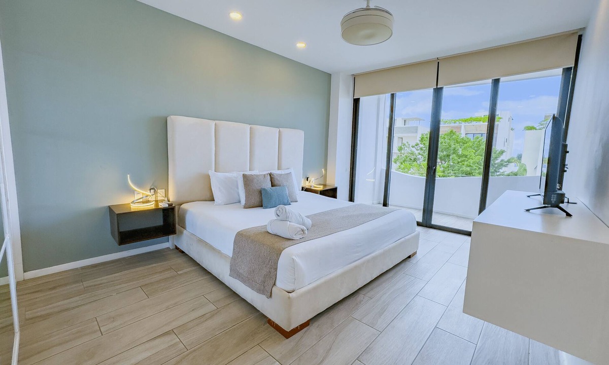 Luis Donaldo Colosio Apartment | 1BR Apartment w/Private Balcony - Rooftop Pool - Walk to Beach & 5th Ave