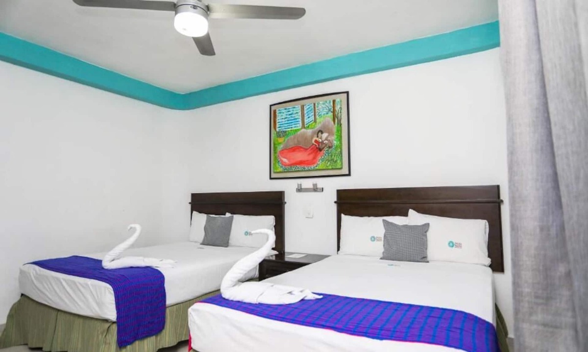 Avenida Tulum Hotel | 4 Rooms w/2 Double Beds Each + Free Parking | Explore Cancún's Attractions!