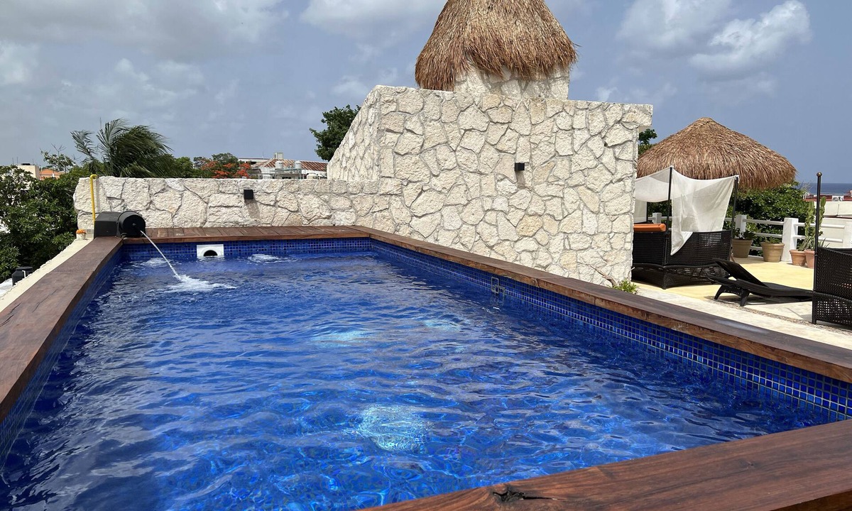 Colonia Centro Apartment | Coastal Escape Suite:Private Balcony, King Bed & Steps to the Cozumel Waterfront