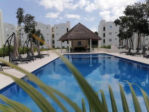 Puerto Juarez Apartment | Departamento moderno con alberca ideal para una escapada cómoda