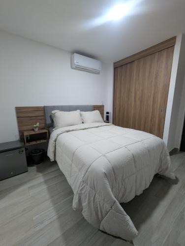 Balcones de Loma Linda Apartment | Habitación Luna, acceso a amenidades de lujo