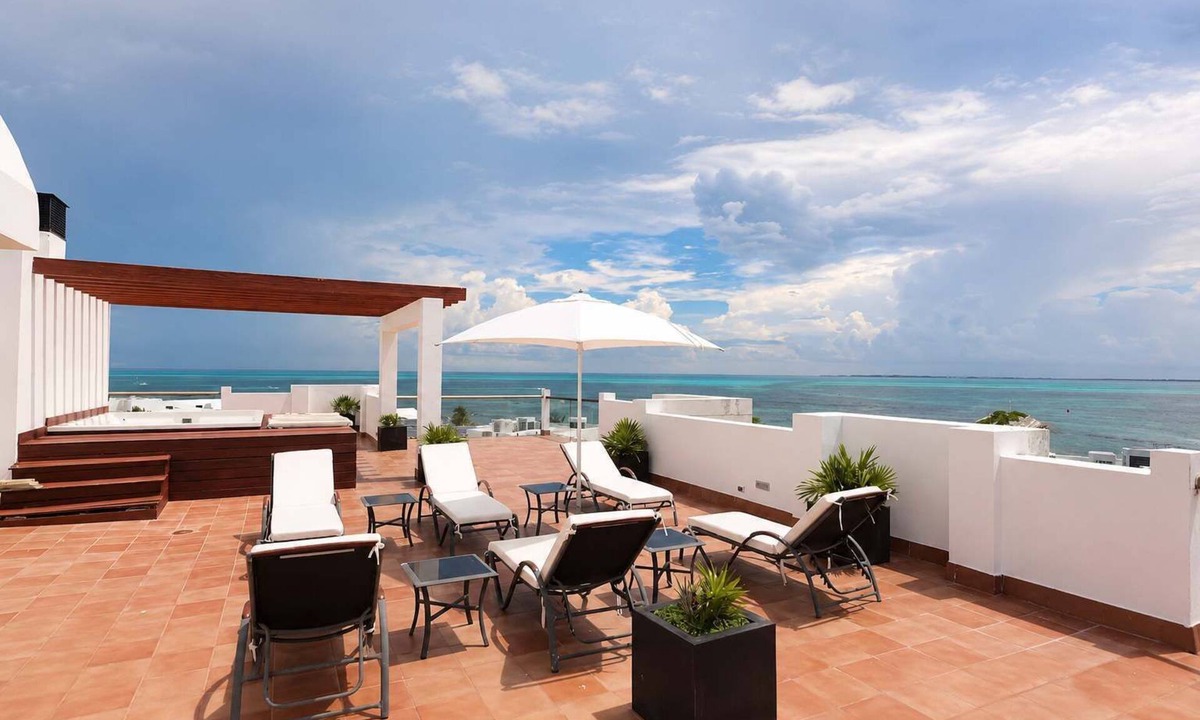 Playa Mujeres Apartment | Oceanview Penthouse with Rooftop Pool & Jacuzzi