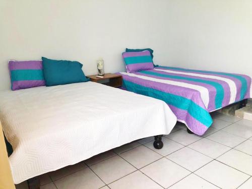 Olimpica Apartment | Olímpica - Departamento Arcoíris - 5 Min Malecón