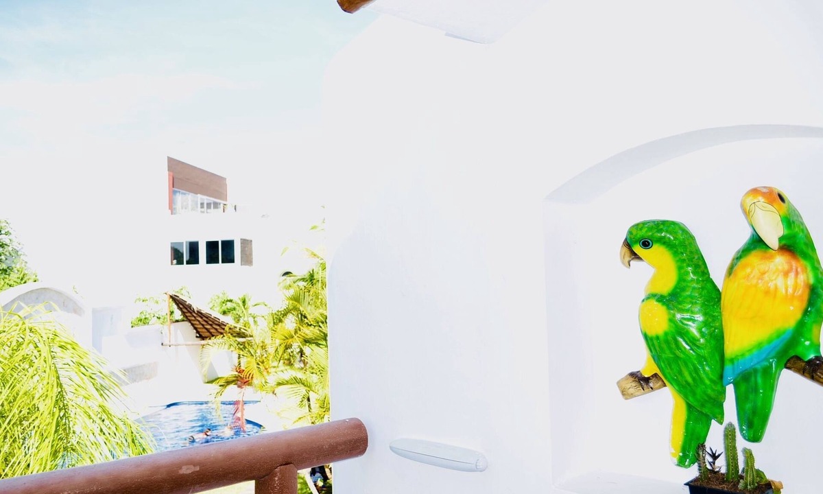 Playacar Bed & Breakfast | Playacar Deluxe Budget Balcony Room With Swimming Pool Air Conditioning and Park