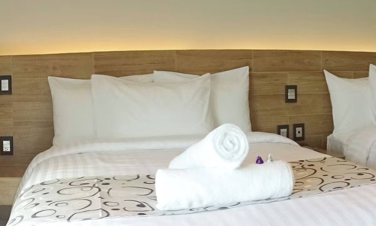 Downtown Cancun Hotel | Relax in 2 Stylish Rooms with Rooftop Sun Terrace in Central Cancún Location