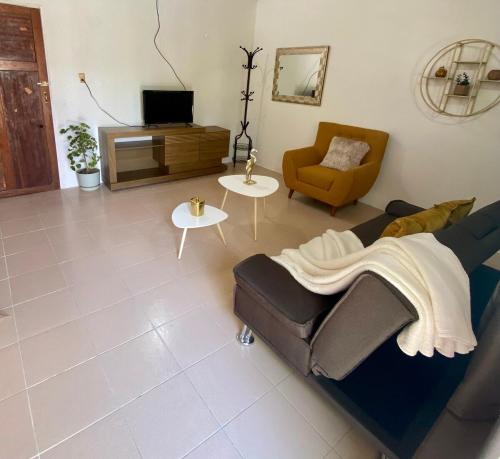 Isla Holbox House | The house of flowers with a courtyard of warm lights