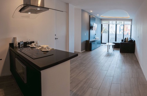 Luis Donaldo Colosio Apartment | 1BR Apartment w/Private Balcony - Rooftop Pool - Walk to Beach & 5th Ave