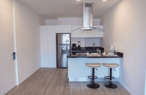 Luis Donaldo Colosio Apartment | 1BR Apartment w/Private Balcony - Rooftop Pool - Walk to Beach & 5th Ave