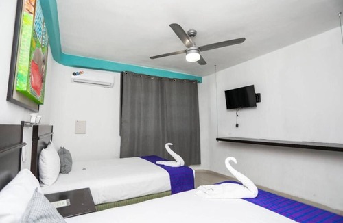 Avenida Tulum Hotel | 3 Vibrant Rooms Perfect for Budget Travelers | Free Parking Included