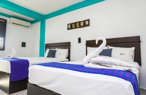 Avenida Tulum Hotel | 3 Vibrant Rooms Perfect for Budget Travelers | Free Parking Included