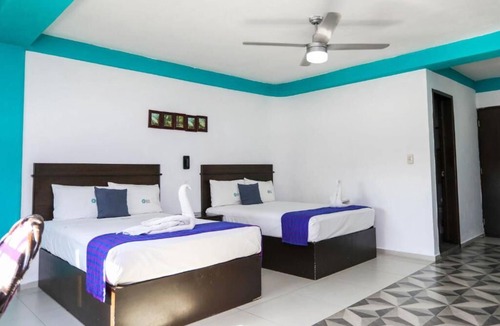 Avenida Tulum Hotel | 4 Rooms w/2 Double Beds Each + Free Parking | Explore Cancún's Attractions!