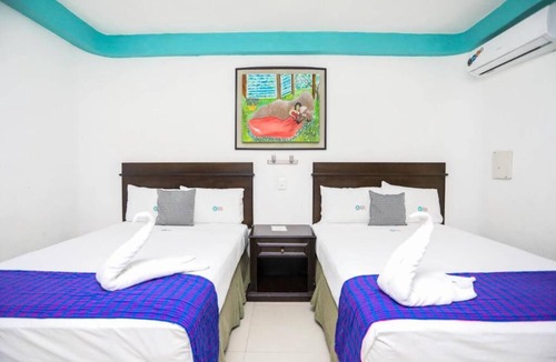 Avenida Tulum Hotel | 4 Rooms w/2 Double Beds Each + Free Parking | Explore Cancún's Attractions!