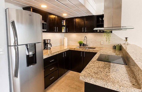 Puerto Aventuras Condo | Beachfront condo with loft and sea views
