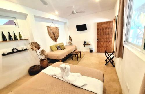 El Cuyo Hotel | Casa Maria Bonita & Restaurant El Cuyo by Spot Rentals