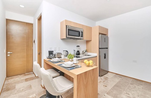 Centro Apartment | Coastal escape w/rooftop pool, gym & beach walk