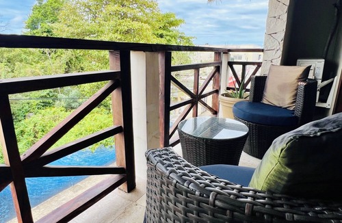 Colonia Centro Apartment | Coastal Escape Suite:Private Balcony, King Bed & Steps to the Cozumel Waterfront