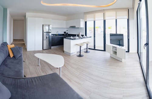 Luis Donaldo Colosio Apartment | Corner Apartment w/Large Private Balcony - Pool Rooftop - 3 Blocks to Beach