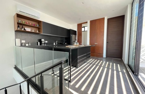 Merida Apartment | Cozy loft with private jacuzzi.
