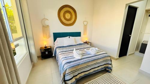 Puerto Juarez Apartment | Departamento moderno con alberca ideal para una escapada cómoda