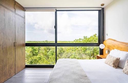 Ek Balam Village Apartment | Designer Penthouse - Jungle Views, Bike to Beach