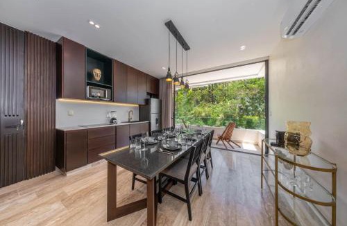 Zama House | Elegant 2BR w Rooftop Pool Close to Beach