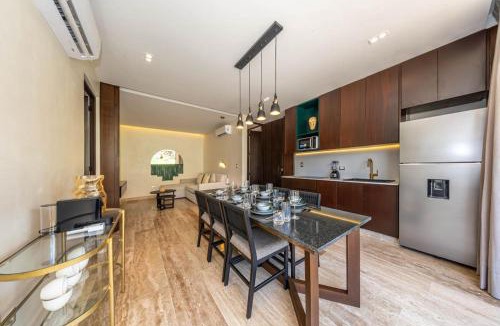 Zama House | Elegant 2BR w Rooftop Pool Close to Beach