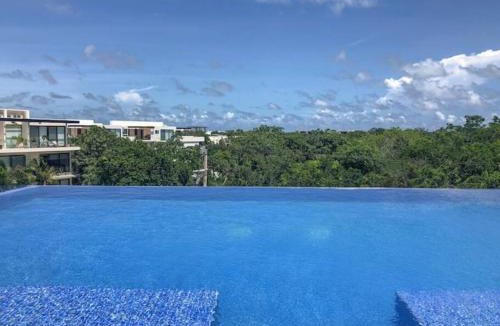 Tulum House | EXCLUSIVE BUILDING INFINITY POOL AND GYM RESTAURANTS AND BAR DISTRICT NEARBy