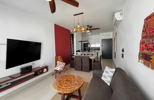 Puerto Juarez Condo | Green Living! Solar-Powered Rooftop Condo with Semi-Olympic Pool-Summer Discount