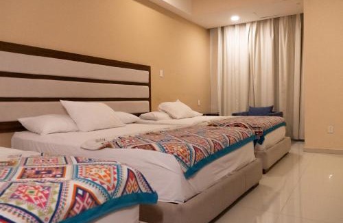 Alfredo V. Bonfil Apartment | Infinity Suites Habitación Triple 211