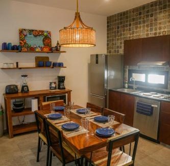 Mario Villanueva Madrid Apartment | Kam Na Ha #202 - Elegant, newly listed, 2 Bedroom Retreat with Rooftop Oasis and Pool