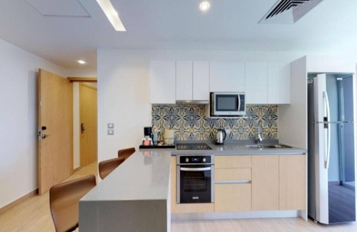 Villa Juarez Apartment | Luxurious Suite w/King Bed, Balcony, Kitchen, Private Transfers ALL-INCLUSIVE