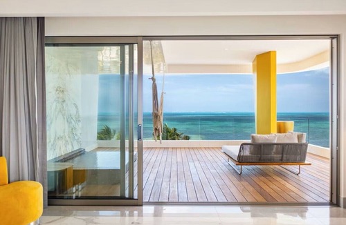 Punta Sam Apartment | Luxury Adults-Only Oceanfront 1-Bedroom