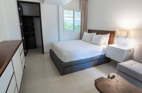 Marina Vallarta Condo | Luxury beachfront condo in Porto Fino, bonus studio, private beach, pool.