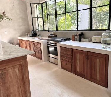 Francisco Uh May Villa | Luxury Jungle villa with cenote pool near Tulum