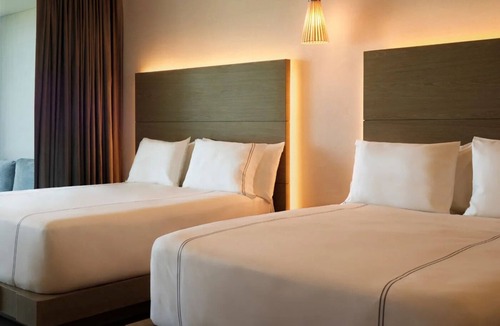 Punta Sam Hotel | Marina View Suites with Pools and Island Adventures Nearby
