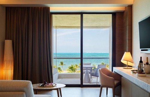 Punta Sam Hotel | Marina View Suites with Pools and Island Adventures Nearby