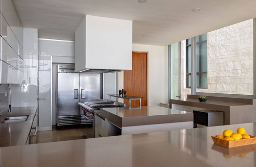Centro Villa | Modern 7 bed, beachfront masterpiece close to town!
