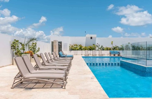 Luis Donaldo Colosio Condo | Modern Condo Steps to 5th Ave and Beach w Rooftop Pool