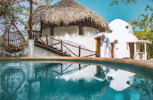 El Cacalote Cabin | New Ruins Off-The-Grid SuperAdobe Domes with Pool