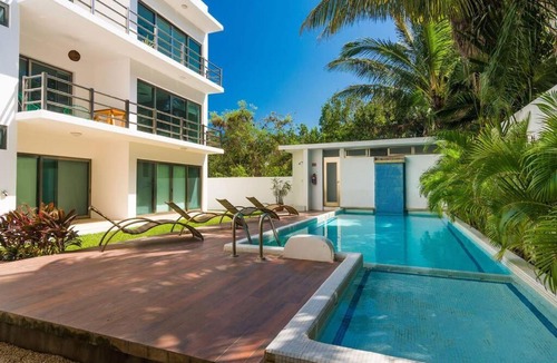 Villa Juarez Apartment | Paraiso304; Luxury condo 3 min walk to the beach.