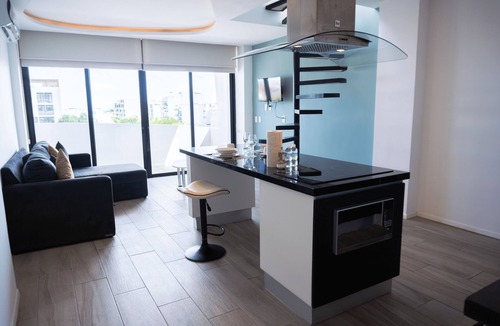Luis Donaldo Colosio Apartment | Penthouse w/Private Terrace & Tub | Rooftop Pool | Near Beach