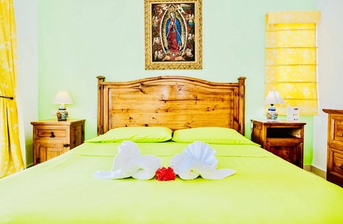 Playacar Bed & Breakfast | Playacar Deluxe Budget Balcony Room With Swimming Pool Air Conditioning and Park