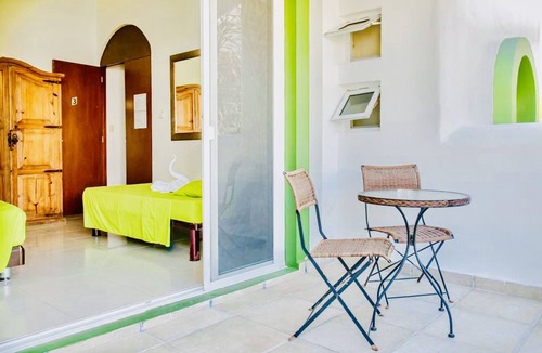 Playacar Bed & Breakfast | Playacar Deluxe Budget Balcony Room With Swimming Pool Air Conditioning and Park