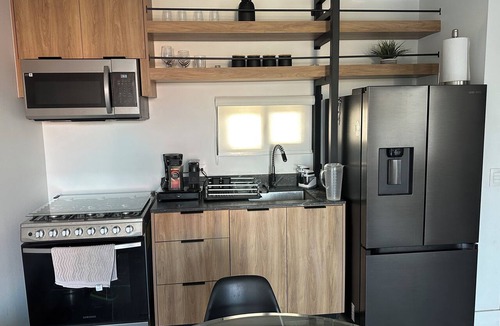Centro Apartment | Sleek Modern Condo in Downtown Tijuana - Free Parking, 24/7 Security, and Rooftop