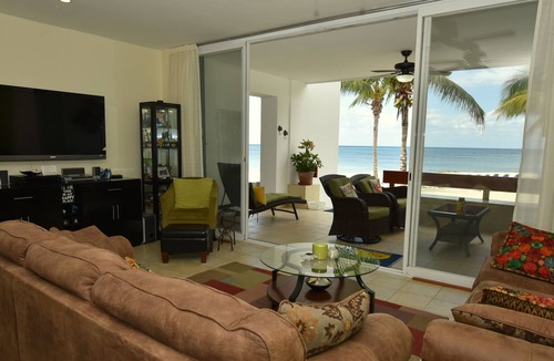 Costa Maya Condo | Step Off your private terrace to the Sandy Beach
