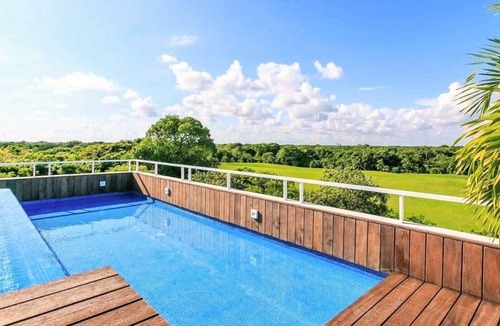 Villa Juarez Condo | Stylish condo in luxury Corasol beach/golf resort