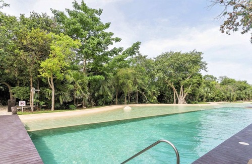 Villa Juarez Condo | Stylish condo in luxury Corasol beach/golf resort