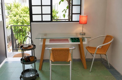 Americana Apartment | Stylish studio apartment in Centro/Colonia Americana—with a pool, balcony, and gardens.