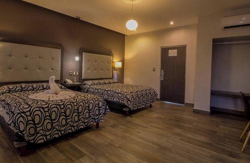 Centro Hotel | Your Downtown Hub for Fun and Exploration: 4 Spacious & Relaxing Rooms in Merida