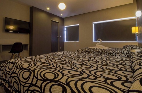 Centro Hotel | Your Downtown Hub for Fun and Exploration: 4 Spacious & Relaxing Rooms in Merida